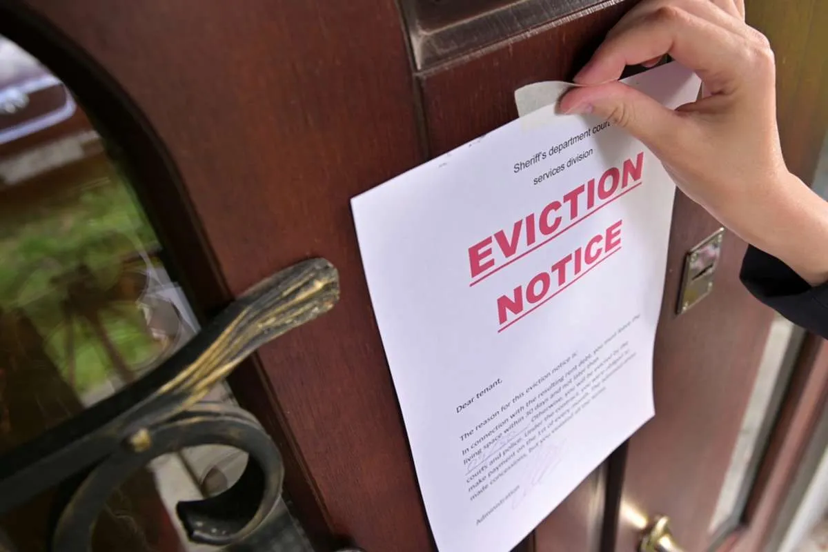 A property manager preparing an eviction notice.