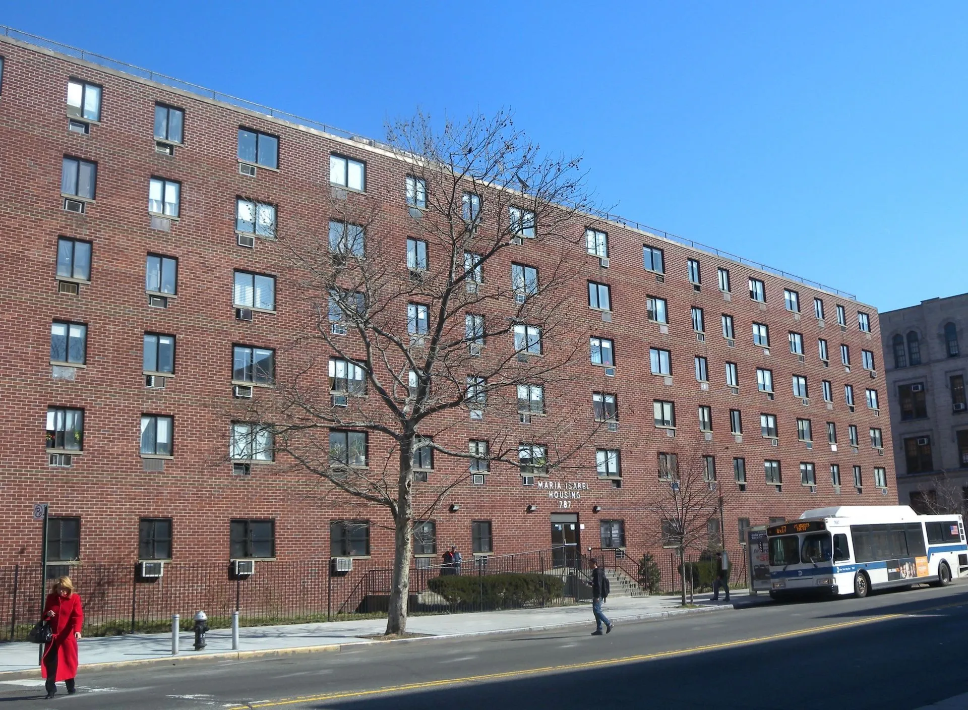 A multi-story affordable housing apartment building.